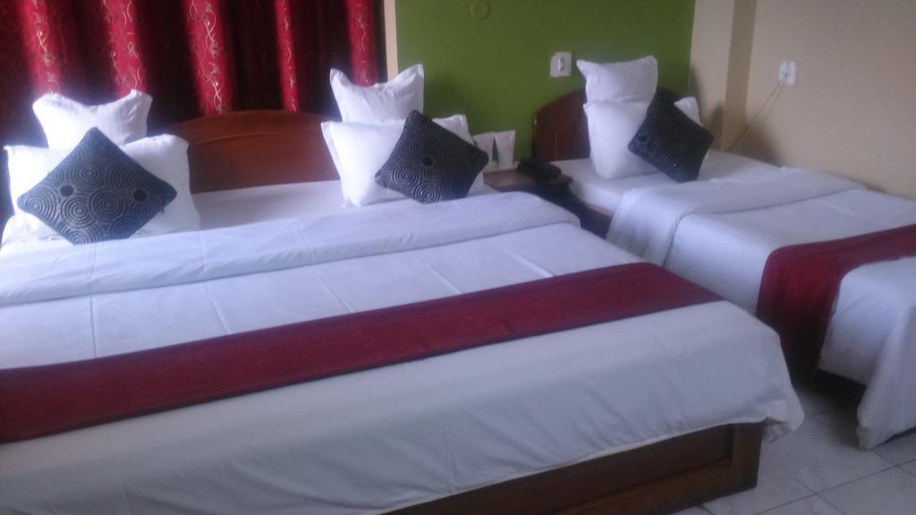 Breeze Hotel Siliguri Kamer foto