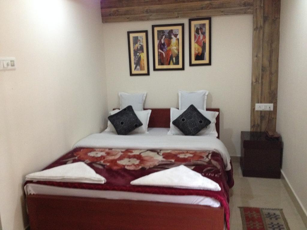Breeze Hotel Siliguri Kamer foto